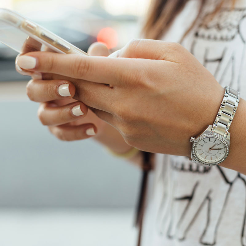 Hand with a cellphone in it